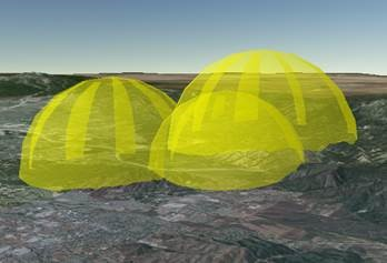 Trois dômes jaunes transparents dont les faces arrière sont visibles à travers les faces avant